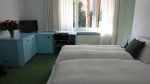 Voodi või voodid majutusasutuse Villa Garni Gardenia toas