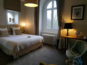 Postel nebo postele na pokoji v ubytování L'Hôtel Particulier Ascott + 24 fotografií