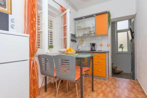 Kuchyň nebo kuchyňský kout v ubytování Premium Center Apartments