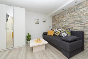 Posezení v ubytování Premium Center Apartments