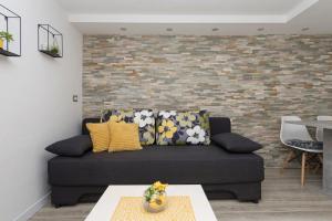 Posezení v ubytování Premium Center Apartments