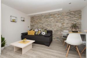 Posezení v ubytování Premium Center Apartments
