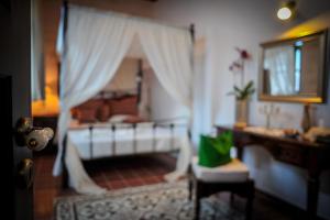 A bed or beds in a room at Villa Amalia