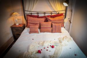 A bed or beds in a room at Villa Amalia