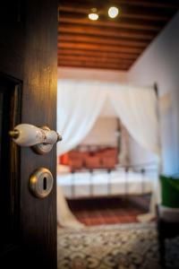 A bed or beds in a room at Villa Amalia