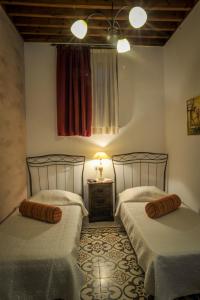 A bed or beds in a room at Villa Amalia