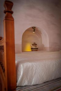 A bed or beds in a room at Villa Amalia