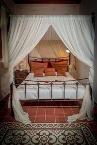 A bed or beds in a room at Villa Amalia
