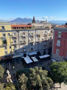 an aerial view of a city with buildings at Bellini View in Naples
