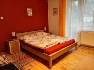 Postel nebo postele na pokoji v ubytování Nagykő Vendégház