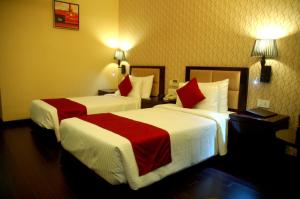 Postel nebo postele na pokoji v ubytování Hotel JIVA