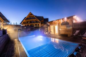 Bazén v ubytování POD SKOCZNIA SPA Zakopane nebo v jeho okolí