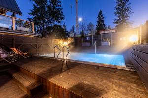 Bazén v ubytovaní POD SKOCZNIA SPA Zakopane alebo v jeho blízkosti