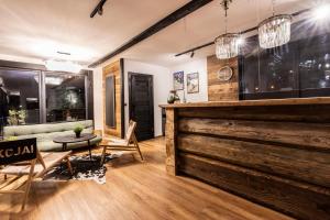 Posezení v ubytování POD SKOCZNIA SPA Zakopane