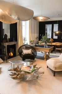 Ein Sitzbereich in der Unterkunft Villa Louisa
