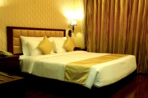 Postel nebo postele na pokoji v ubytování Hotel JIVA