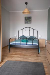 Posteľ alebo postele v izbe v ubytovaní Apartament Ventus Business and Living 44