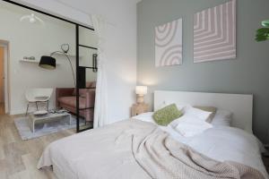 Posteľ alebo postele v izbe v ubytovaní Warsaw Concierge Stalowa