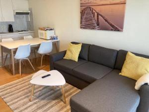 
A seating area at Appartment Blankenberge with front sea view
