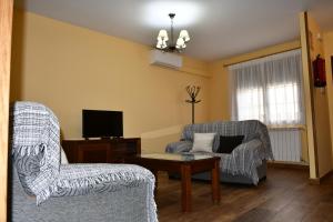 TV a/nebo společenská místnost v ubytování Casa Rural Las Canchaleras