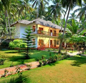 Foto da galeria de Abad Harmonia Ayurvedic Beach Resort em Kovalam