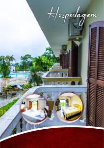 a view of a balcony with a bed on a building at Mata Atlântica Park Hotel in Matinhos