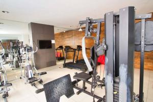 a gym with several tread machines in a room at MONOAMBIENTE EN EQUIPETROL NORTE -Onix 407 in Santa Cruz de la Sierra