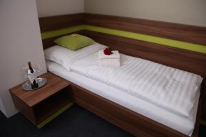 Posteľ alebo postele v izbe v ubytovaní Primus Hotel & Apartments