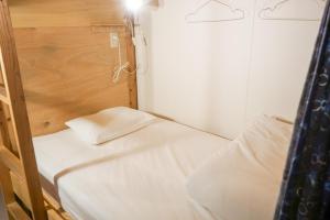 Postel nebo postele na pokoji v ubytování Hostel TangaTable