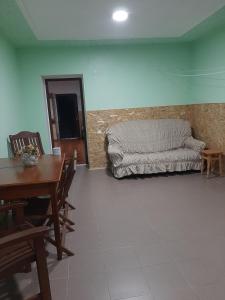 a living room with a couch and a table at Семейный отдых у моря в Черноморке in Odesa