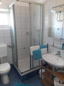 Koupelna v ubytování Apartments SoldInn