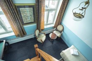 an overhead view of a room with chairs and windows at Nina Kordon Guesthouse in Alatskivi
