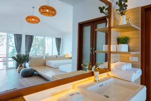 Voodi või voodid majutusasutuse Vimarn Samed Resort toas