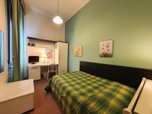 Postel nebo postele na pokoji v ubytování Hotel Continentale