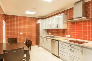 A kitchen or kitchenette at Villa Happy Dreamer