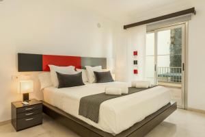A bed or beds in a room at Villa Happy Dreamer
