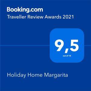 a screenshot of a phone with a travel trailer review awards at Holiday Home Margarita in Seget Vranjica