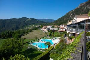 a view of a resort with a swimming pool at Hotel La Fenice e Sole in Tremosine Sul Garda