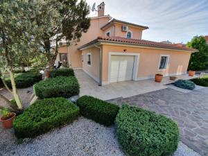 Vonkajšia záhrada v ubytovaní Sea View - Casa di Arijana