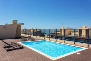Πισίνα στο ή κοντά στο Privilege Apartment Benet with Rooftop Pool, Village Marina - Olhão