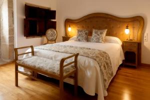 Posteľ alebo postele v izbe v ubytovaní CASA RECTORAL DE SAN EUSEBIO