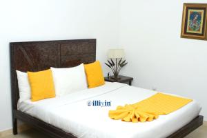 Ein Bett oder Betten in einem Zimmer der Unterkunft ILLIYIN Boutique Hotel