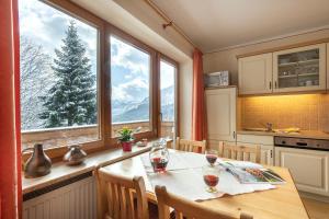 Køkken eller tekøkken på Berggasthaus Steinberg-Alm inkl. Chiemgaukarte