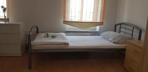 Krevet ili kreveti u jedinici u objektu Gästewohnung 4-Raum Wohnung für 2-8 Personen