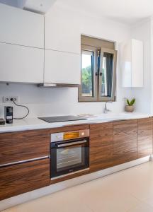 Kuchyňa alebo kuchynka v ubytovaní Horizon Villa Almyrida