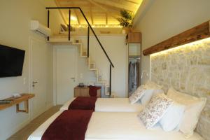 Photo de la galerie de l'établissement Villa Estia - private jacuzzi next to the beach, à Ágios Geórgios