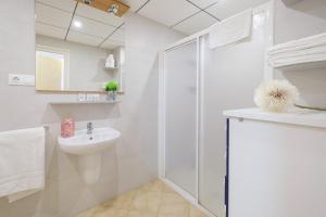 Ванная комната в Apartamentos Deauville