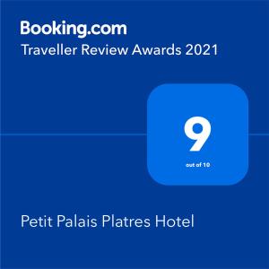 
a blue and white screen with a blue and white sign at Petit Palais Platres Hotel in Platres
