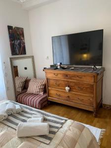 TV a/nebo společenská místnost v ubytování Paradiso numero 12