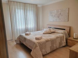 Postel nebo postele na pokoji v ubytování Appartement Cime l'Est